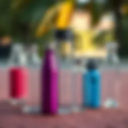 A collection of clear travel bottles displayed on a textured surface, showcasing their design diversity.