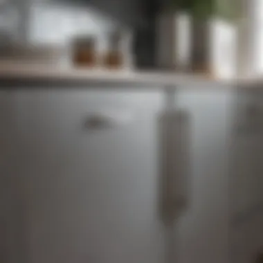 Close-up of stainless steel contact paper on a kitchen cabinet