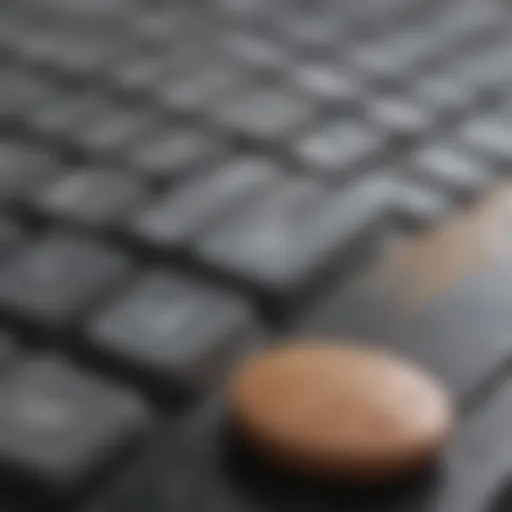 Close-up of cleaning putty being used on keyboard keys