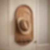 Elegant wooden hat rack mounted behind a door