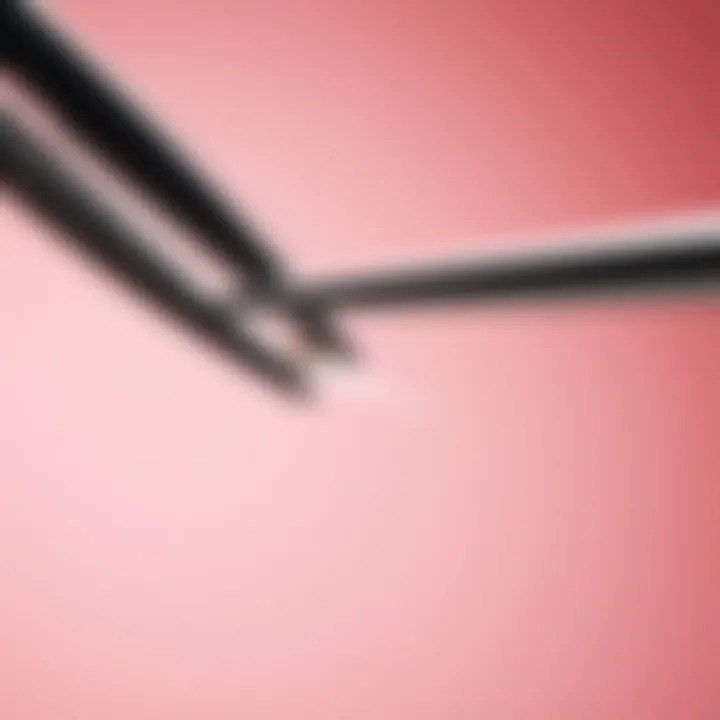 Close-up of tweezers gripping an ingrown hair